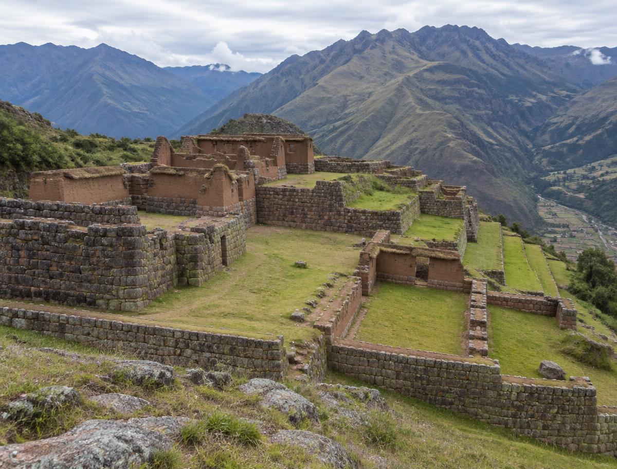 Stone and adobe buildings and terraces of Huchuy Qosqo high above the Sacred Valley